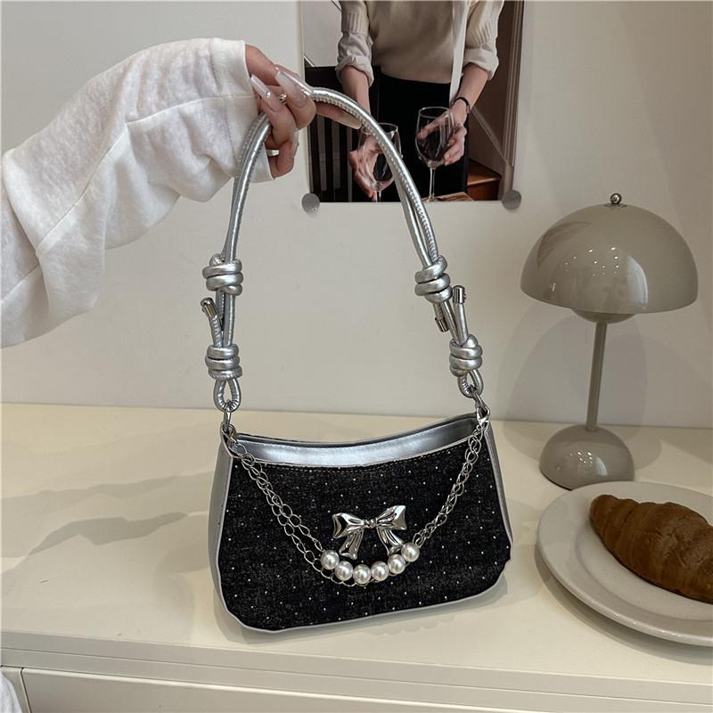 

Niche summer new fashion armpit bag female bow popular personality high-grade texture temperament messenger bag чёрный