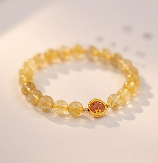 

Браслет з намистин з цитрину та рутилового кварцу для жінок