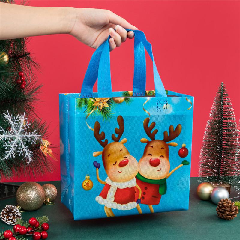 StoBag, Froh und Hell, Weihnachtliche Vliestaschen, Weihnachtsmann, Rentier, Schneeflocke, Verpackung für Geschenk, Wiederverwendbar, 12/30 Stück