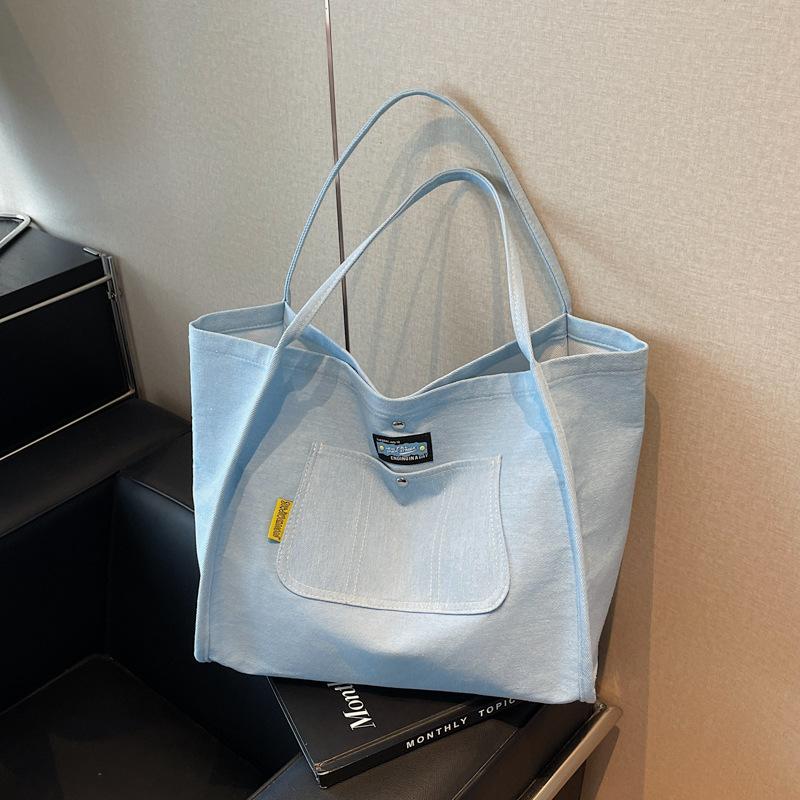 

Simple and large-capacity denim tote bag women s new versatile commuter shoulder bag portable fashion shopping bag tide светло-синий