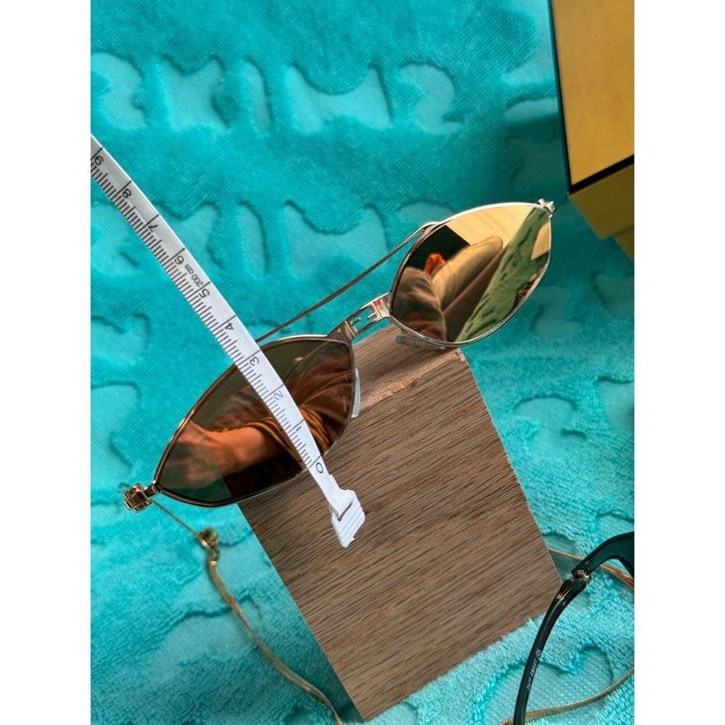 Used FENDI sunglasses with chain gold