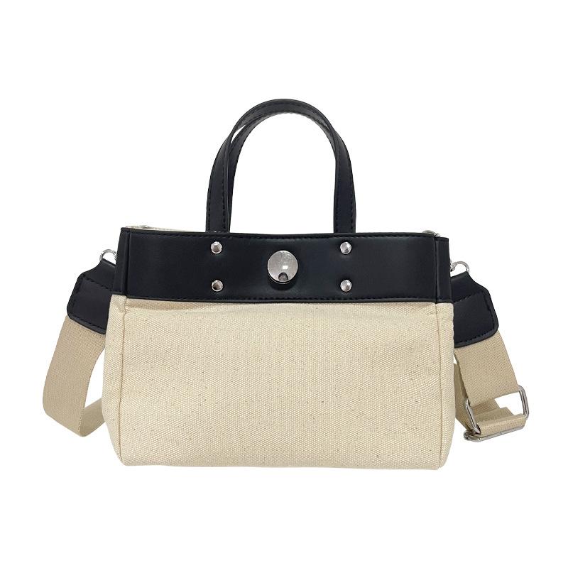 

New niche design simple fashion canvas large capacity commuting wind tote bag casual texture hand without pendant чёрный
