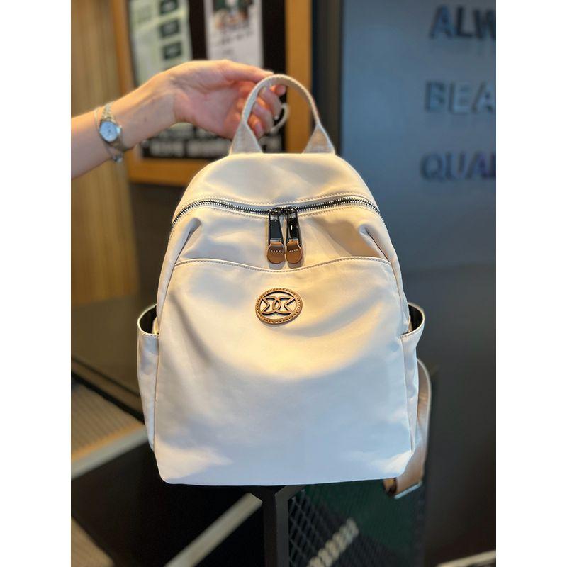 

Waterproof Oxford Cloth Backpack Female 2025 Autumn New Arrival Casual Easiest for Match Portable Traveling Backpack Fancy Bag Tide Apricot White