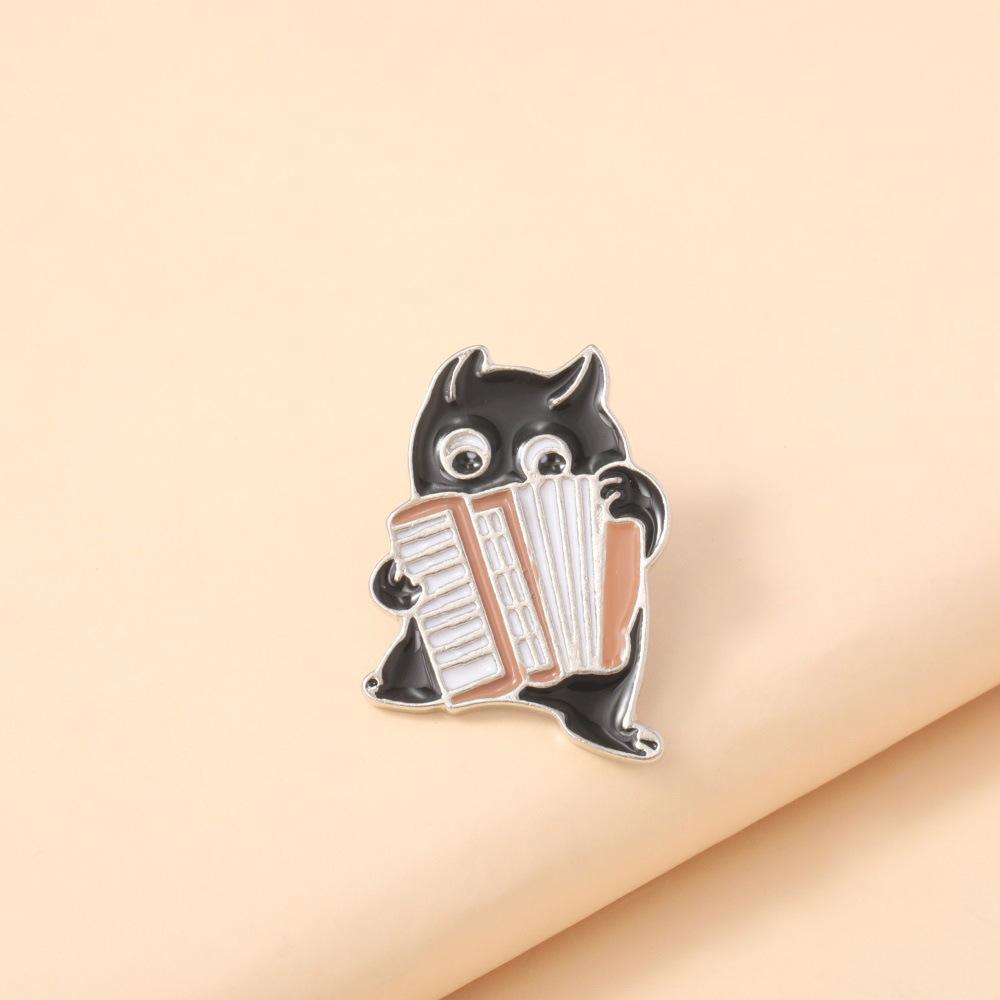 

Creative Brooch, Cartoon Cute Black Animal Accordion Playing Styling Alloy Oil Drop Brooch