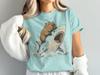 Capybara Riding Shark T-Shirt, Funny Meme Vintage Graphic Tee, Retro Animal Lover Shirt, Quirky Great White Shark Surfing Gift for Him or