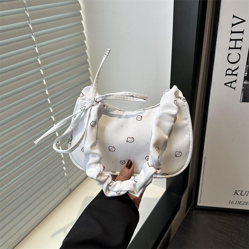 

Зарубежный стиль милая ниша японская простая сумка под мышкой женская новая мультяшная с принтом плиссированная изысканная премиальная сумка через плечо