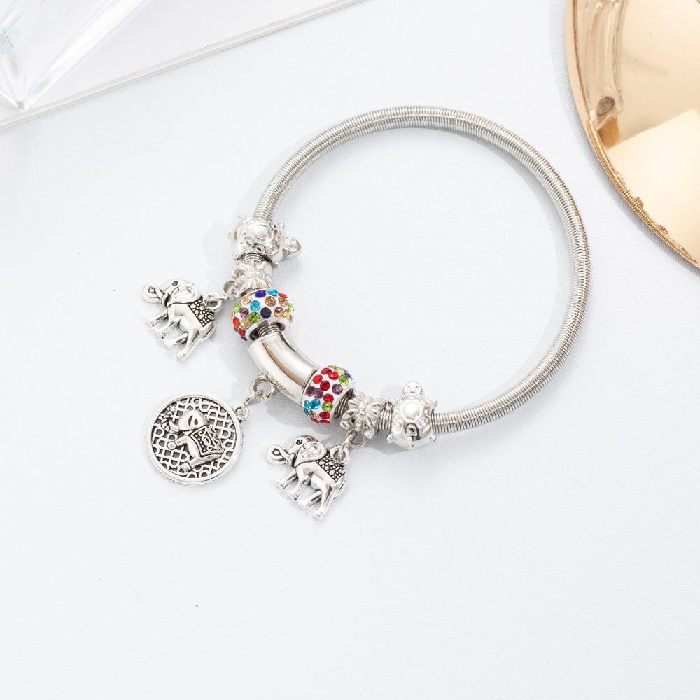 Exquisite Elephant Pendant Bangle Bracelet for Women - Spring Elastic Animal Jewelry Gift