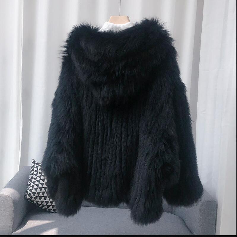 Nuovo cappotto invernale leggero grande orso bianco tessuto imitazione pelliccia di volpe da donna medio e lungo con cappuccio