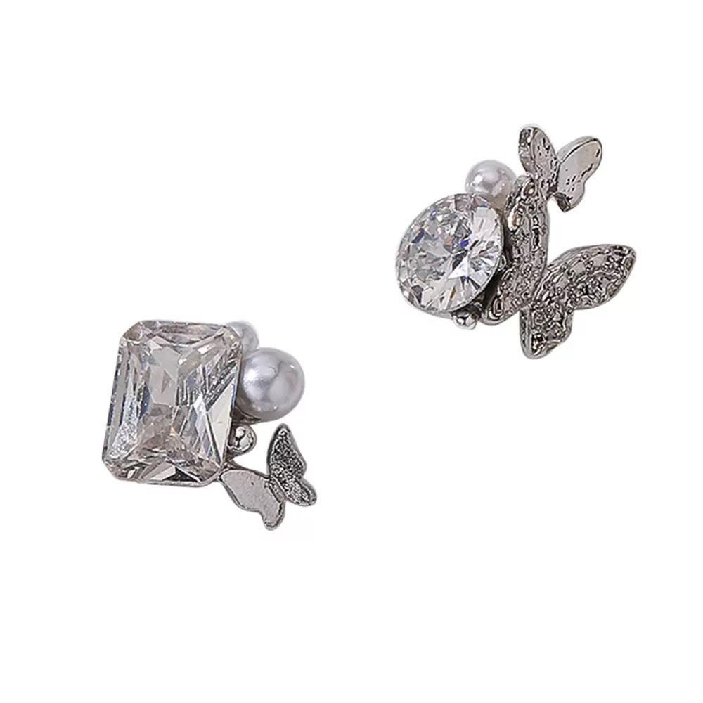 Elegant Nail Art: Pearl & Butterfly Inlaid Pigeon Egg with Zirconia and Rhinestones
