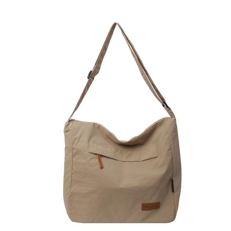 Korean Version Solid Color Labeled Fabric Shoulder Bag New Large Capacity Women's Messenger Pocket Satchel