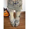 Jeans a zampa alla moda da High Street Donna Pantaloni in denim strappato Design bootcut Look vintage trendy