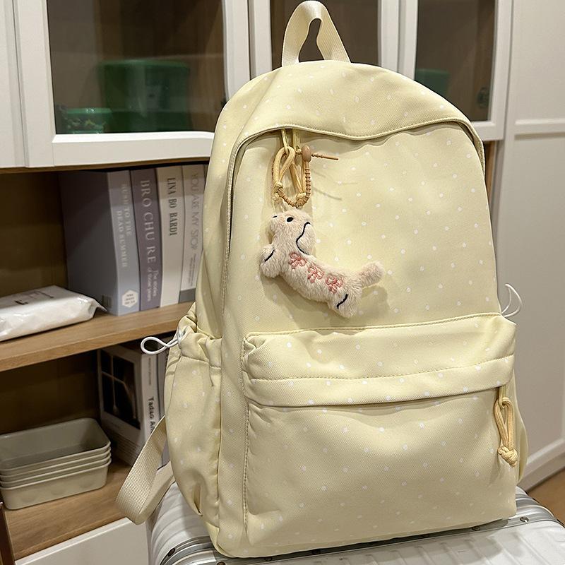 Korean version of polka dot schoolbag female college student simple cute girl backpack junior high school girl small fresh backpack tide