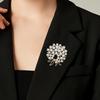 Broche de flor de strass