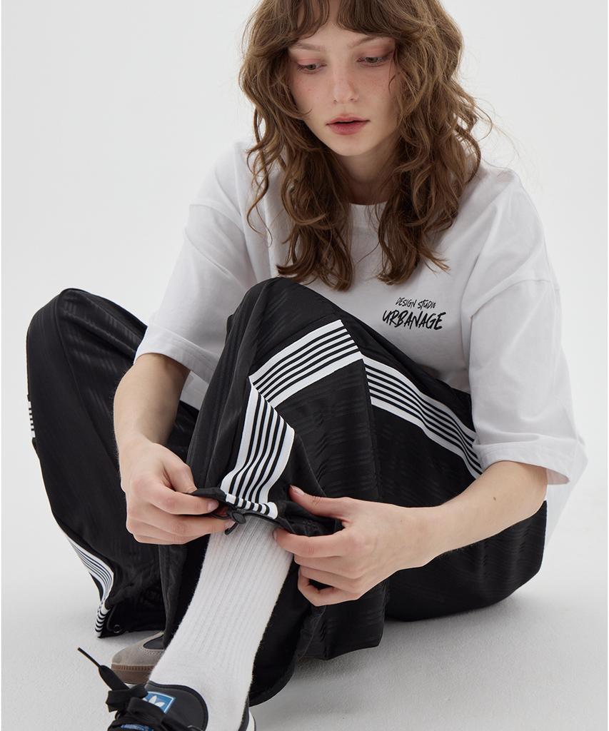 URBANAGE Balloon Fit Curved Line Track Pants_Black