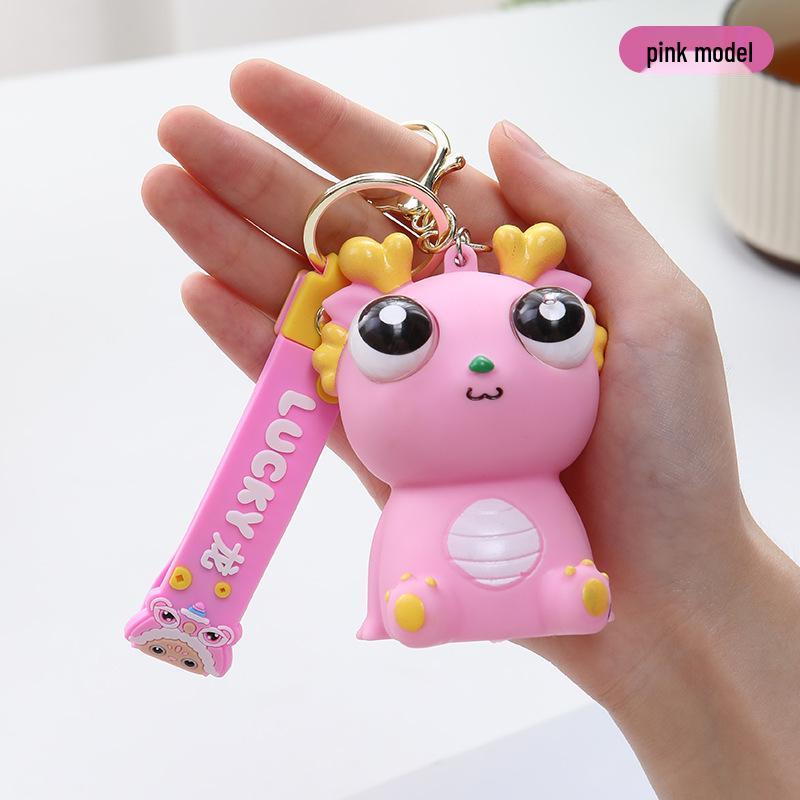 Exploding Eye Dragon Keychain: Squishy Stress Relief Toy and Pendant