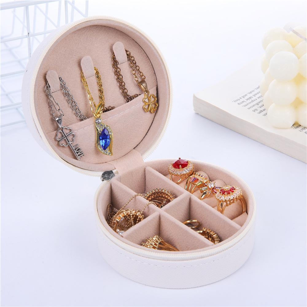 Compact Round Travel Jewelry Box for Earrings, Rings, and Necklaces