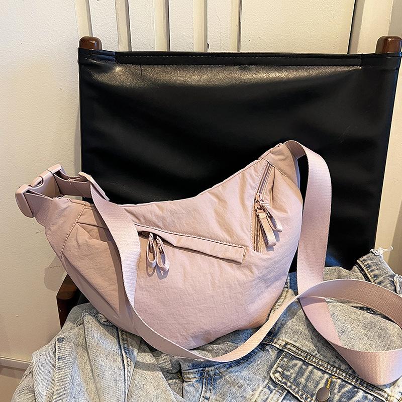 Retro casual dumpling bag new nylon fashion trend line portable shoulder messenger women's bag