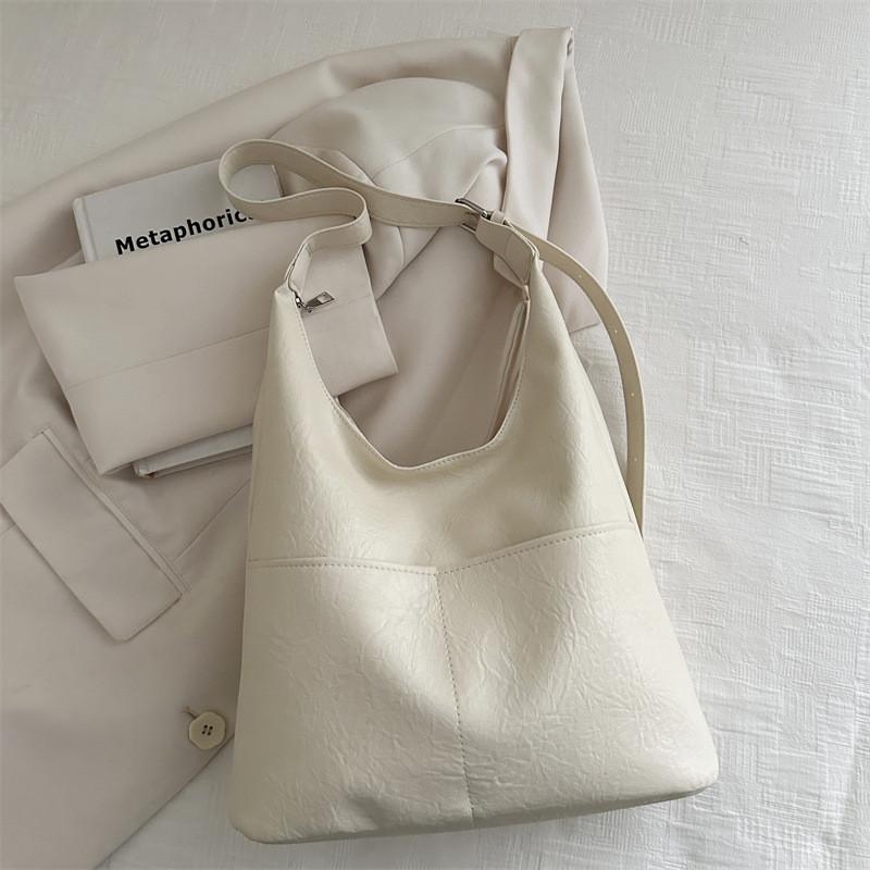 Trendy Casual Pu Tote Bag With Chic Minimalist Style Available In Black Brown Cream Color Perfect For Everyday Outfits