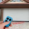 Universal Multi-Frequency Garage Door Remote Control, 280-868MHz, compatible with 310/315/433/868MHz systems.