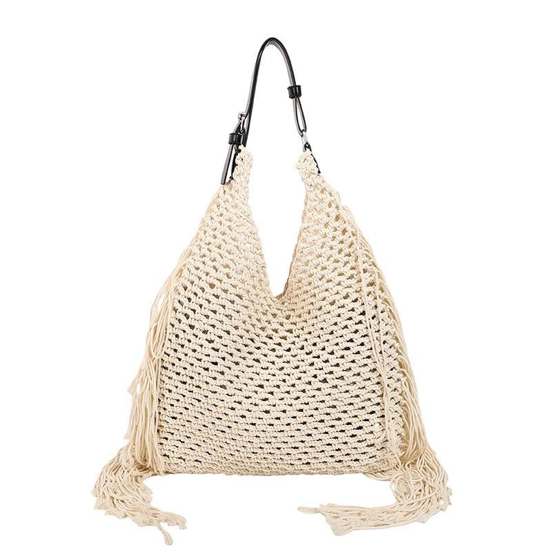 Tassel Hand-woven Tote Bag Women's Summer New Fashion Trend Hollow Versatile Shoulder Armpit Bag
