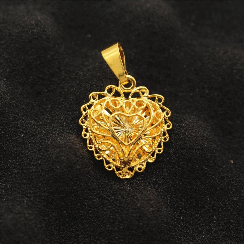 Halskette mit Wassertropfen- und Herzblumenanhänger aus vergoldetem Messing für Damen