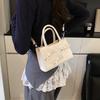 Korean version of bow small square bag women's 2025 summer new simple and fashionable handheld women's bag women's shoulder oblique span bag