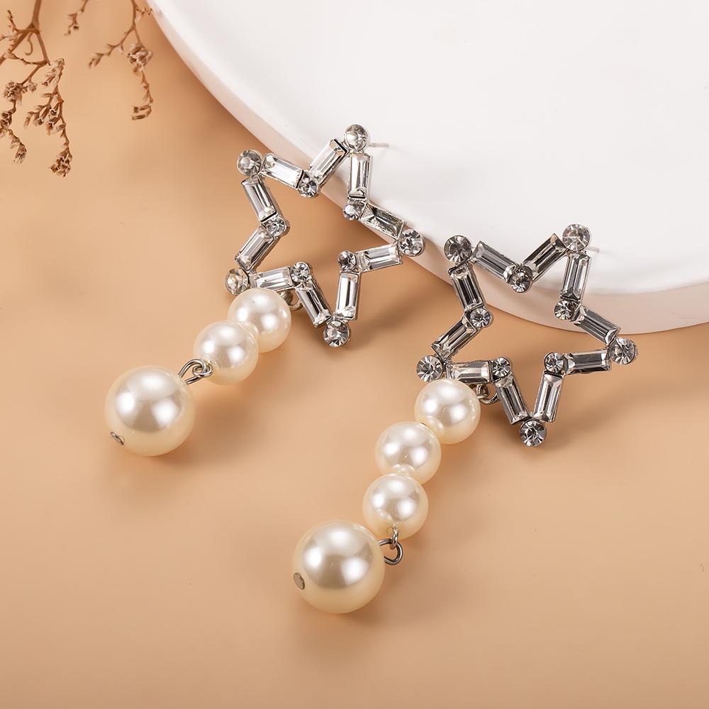 

Модные серьги Полые пятиконечные звезды с жемчугом Асимметричные серьги-капли белый/серебряный