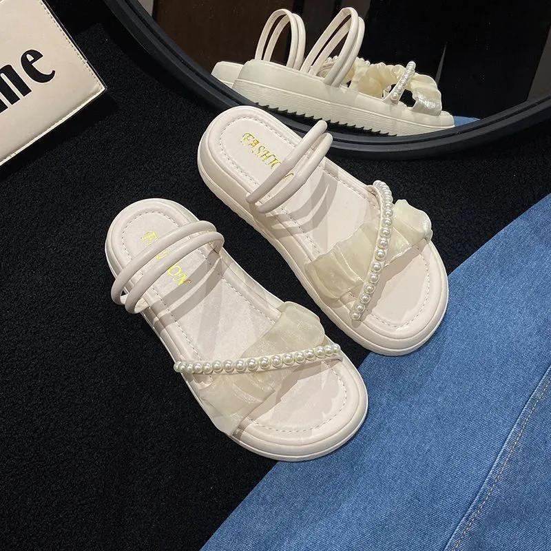 Modische vielseitige Zwei-Trage-Sandalen Feenstil neue Sommerbekleidung Perle Muffin-Plateau Römische Strandschuhe