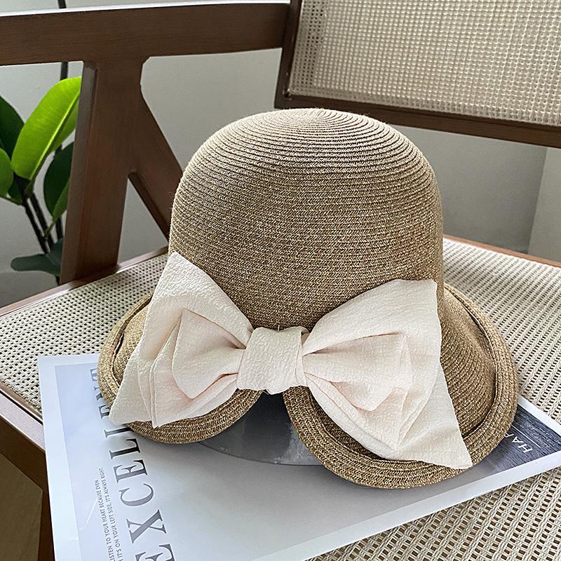 Elegant ribbon bow pearl grass hat women's summer dome seaside outing shading versatile top hat tide