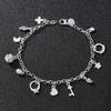 Pulsera de plata europea y americana, pulsera con trece colgantes, joyería de múltiples elementos para mujer, pulsera de estilo simple al por mayor