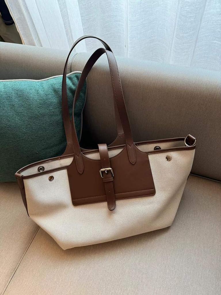 Niche Canvas Cowhide Tote Bag Large Capacity Wing Bun Mother Bag Casual Armpit Bag Women's Shoulder Bag