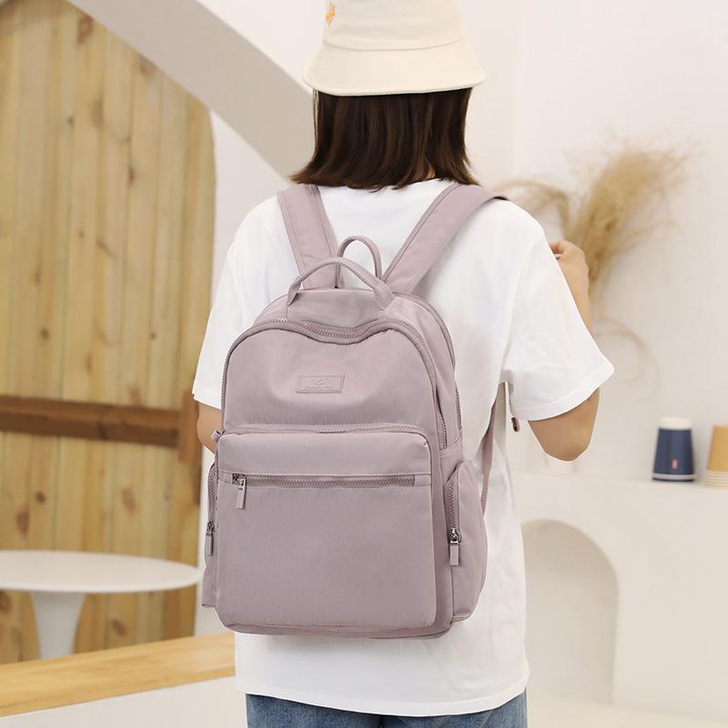 Backpack Men's and Women's Large Capacity Anti-splashing Nylon Backpack Travel Leisure Fashion Trolley Case School Bag