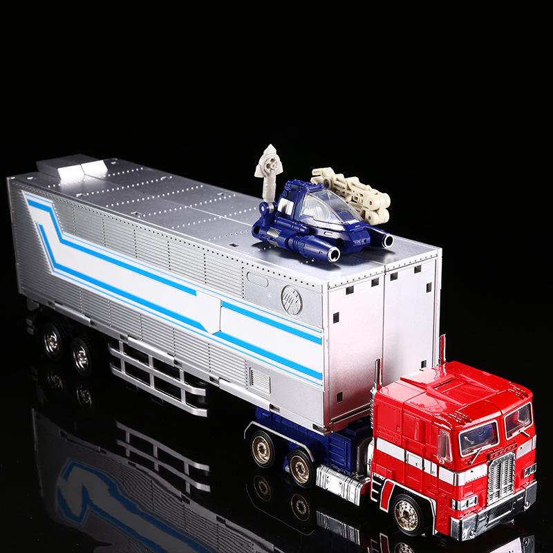 Cool Change Transforming Optimus Prime Trailer Toy - Autobot Model with Spike & Roller