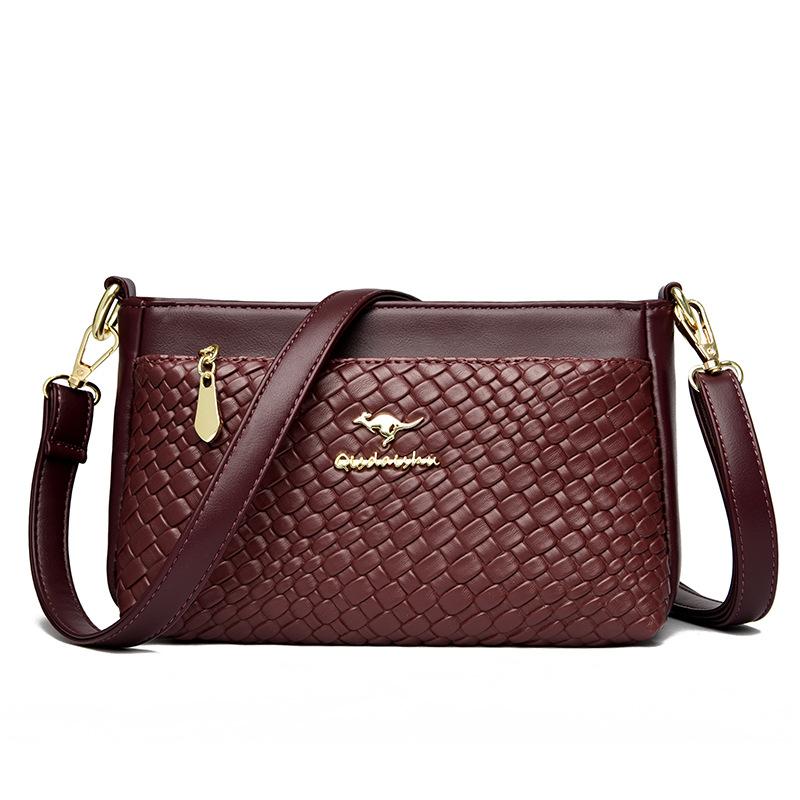 

Simple soft leather mother-in-law and women s bag 2025 new versatile mother bag large capacity women s soft leather shoulder oblique span bag фуксія