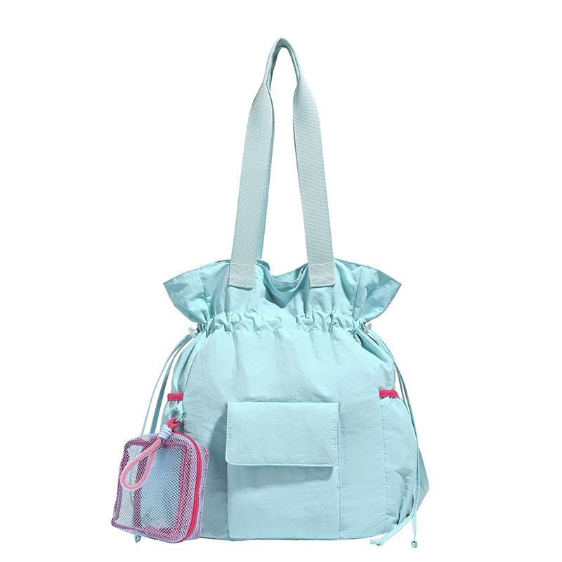Neue Kurztrip-Reisetasche Macaron-Farbe Einfarbige Sporttasche Yogatasche Kordelzugverschluss Aufbewahrung Umhängetasche