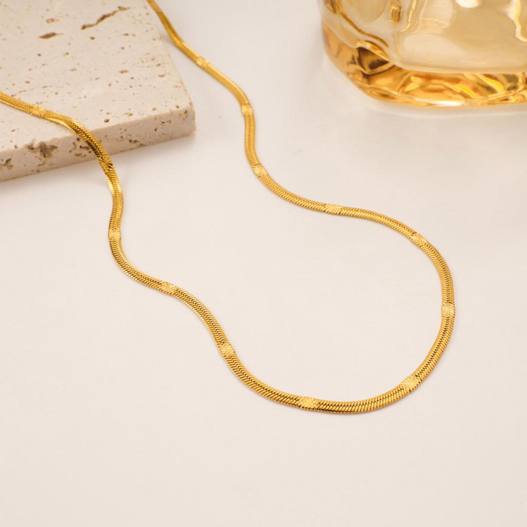 2024 Trendy Titanium Steel Embossed Clavicle Necklace: Light Luxury, Non-Fading, Simple Elegance for Women.