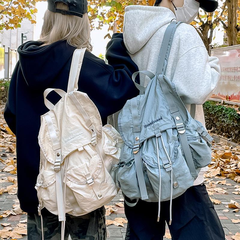 Schoolbag Casual Large Capacity Multi-Pocket Backpack Male Korean Version Niche Premium Travel Backpack Light Commuter Schoolbag Female