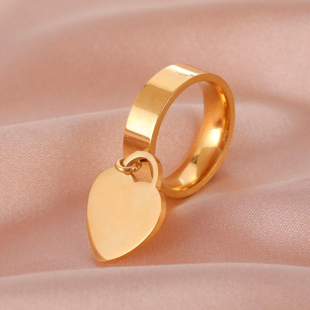 Skyrim New Arrival Stainless Steel Couple Rings With Dangle Heart Pendant Dating Finger Ring Men Voguish Women Stylish Bridal Bridal Lover Jewelry