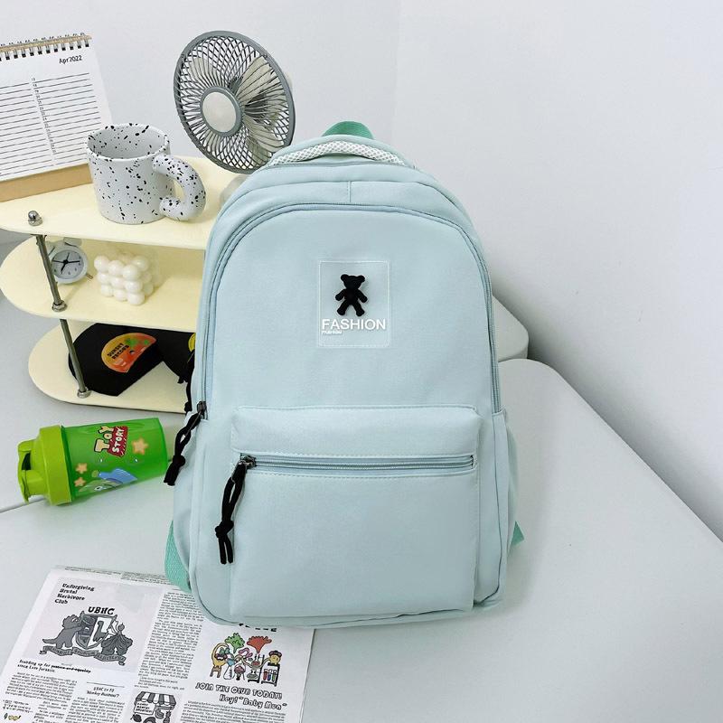 

Casual simple backpack women s summer new solid color large capacity junior high school high school student schoolbag зелений