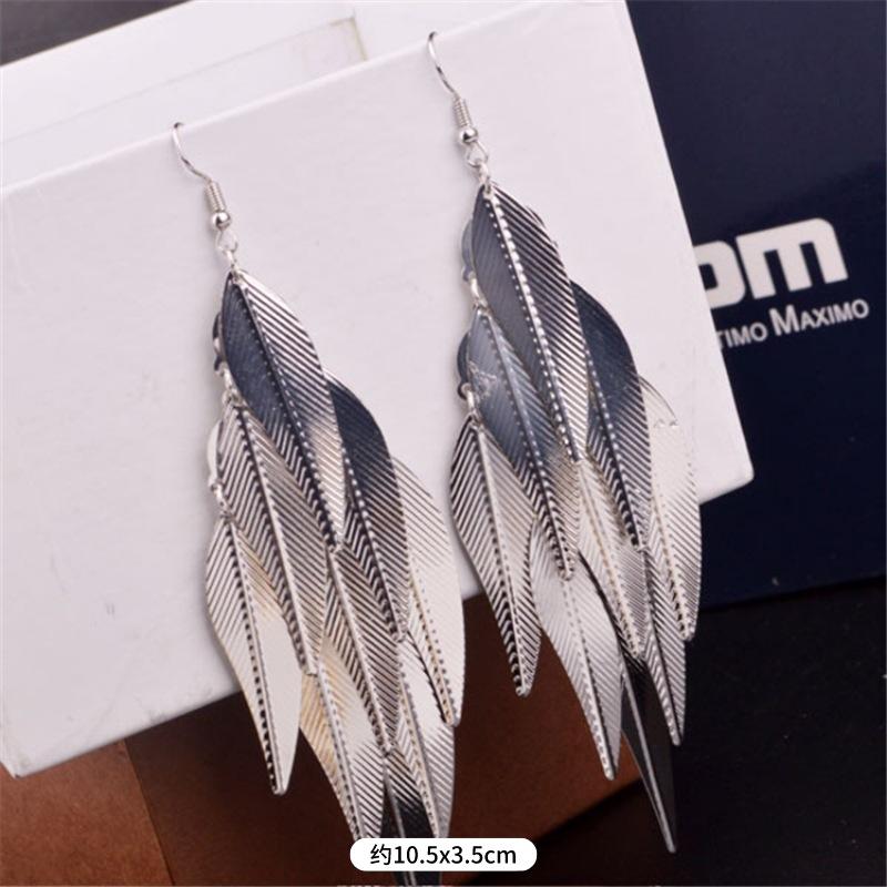 Fashion exaggerated niche temperament fringed earrings retro personality versatile sequined earrings women's long ear jewelry
