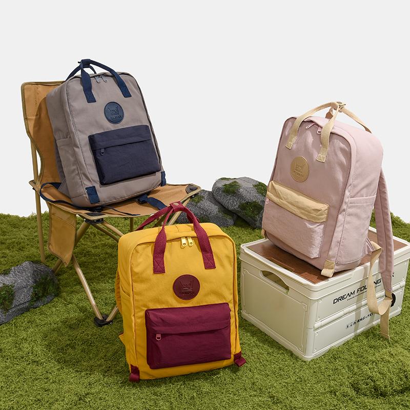 Farbblock-Rucksack mit Fronttasche und gepolsterten Schultergurten