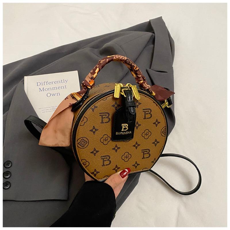 Diagonale Überspannung Nische runde Kuchen Tasche Damen vielseitige Ein-Schulter Messenger Bag High-End kleine runde Tasche Frühling und Sommer Damen Tasche