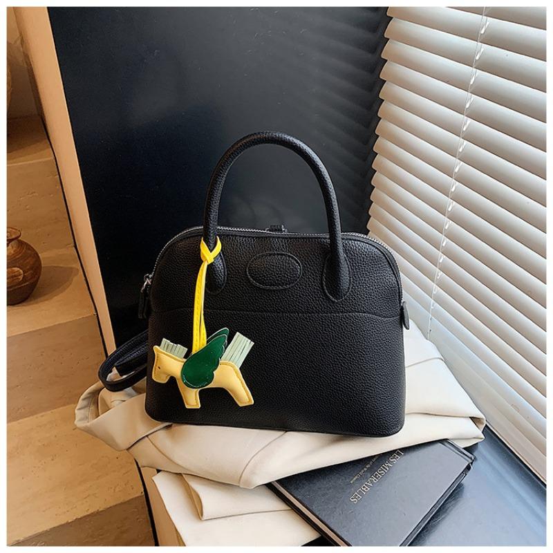 

New spring and summer lychee pattern platinum bag bucket bag single shoulder oblique span portable bowling women s bag чорний