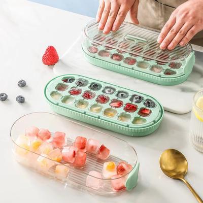 Druck-zum-Entriegeln Eiswürfelform mit Deckel Berührungslose Silikonform für einfaches Entnehmen Lebensmittelgeeignet Auslaufsicher Integrierte Aufbewahrungsbox Unverzichtbar für die Hausbar
