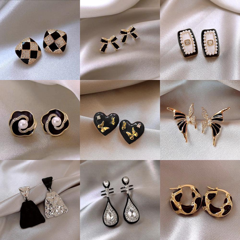Elegant Gold-Plated Black Zircon Stud Earrings - Niche Design for a Luxurious Fashion Statement