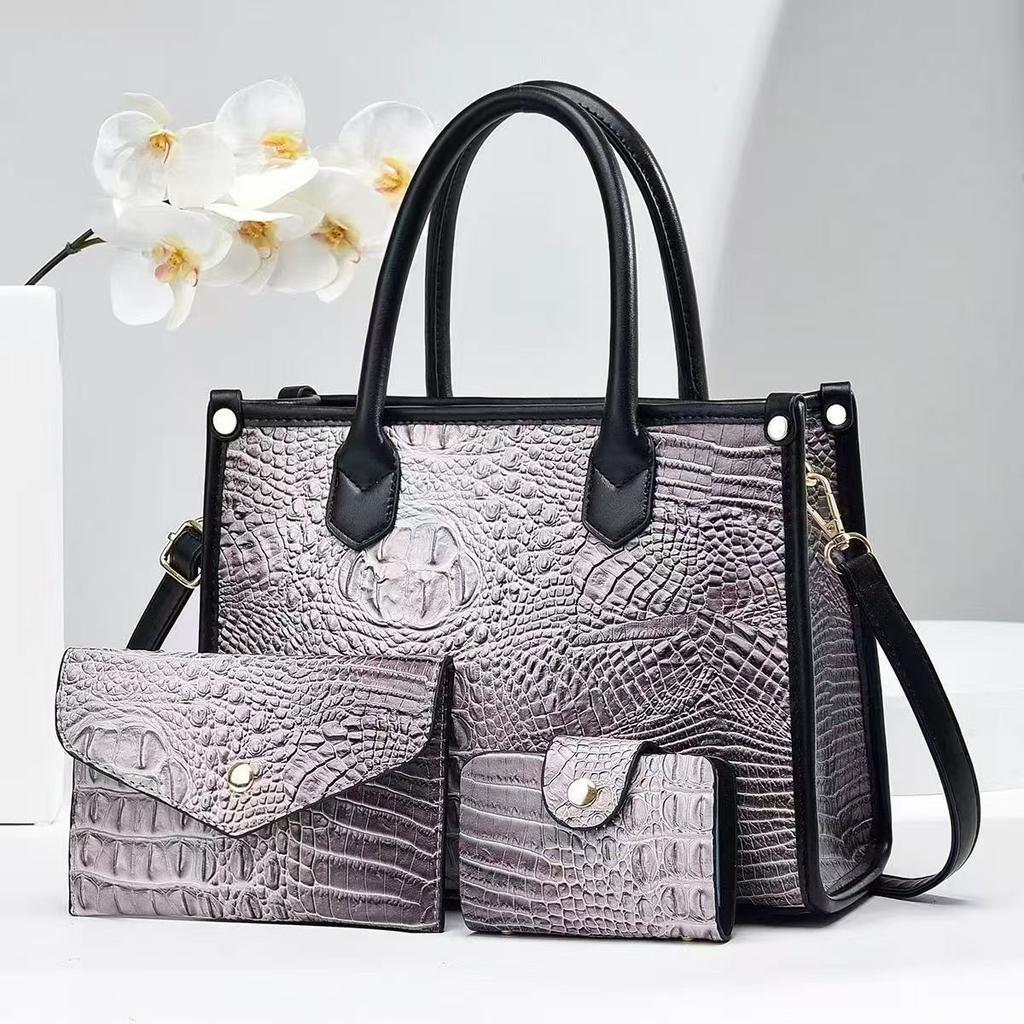 Handheld women's bag 2026 new crocodile pattern texture single shoulder crossbody large capacity three-piece set mother and child bag