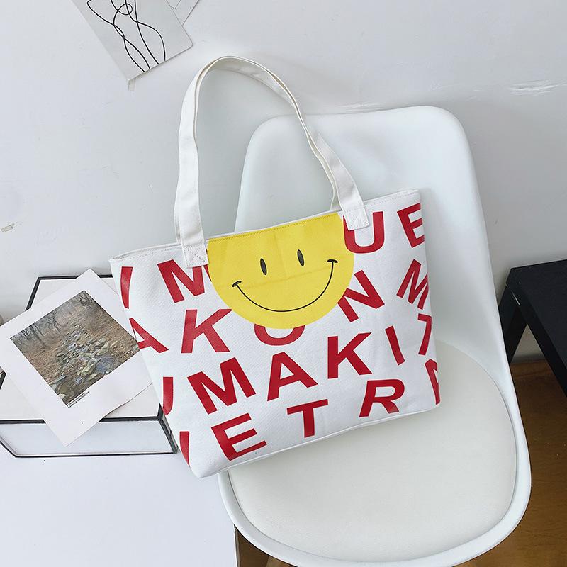 

Smiley face alphabet portable tote bag large capacity out leisure canvas women s bag college student class shoulder bag one size fits all