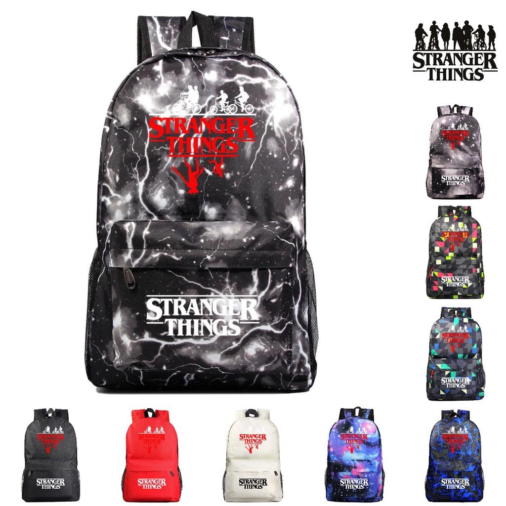 A102 Stranger Things Oxford-Stoffrucksack in Bonbonfarben, wasserdicht und strapazierfähig, ideal für Teenager und Reisende, mit Charaktermotiven)