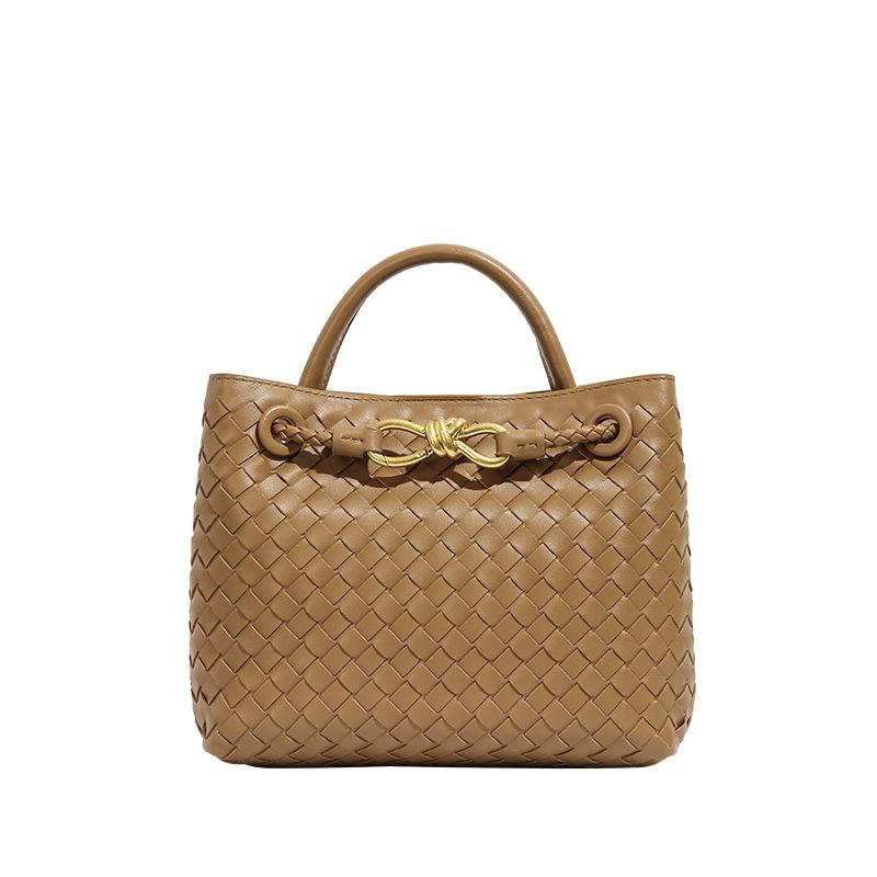 Borsa da donna alla moda e di nicchia, con fiocco, metallo intrecciato a mano e tracolla monospalla casual e capiente.