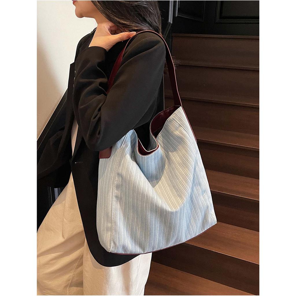 French lazy denim cloth bag for women 2026 new large capacity striped handbag super popular niche single shoulder bag